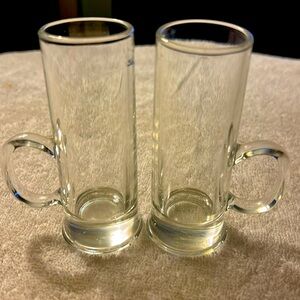 2 Each clear and tall shot glasses EUC